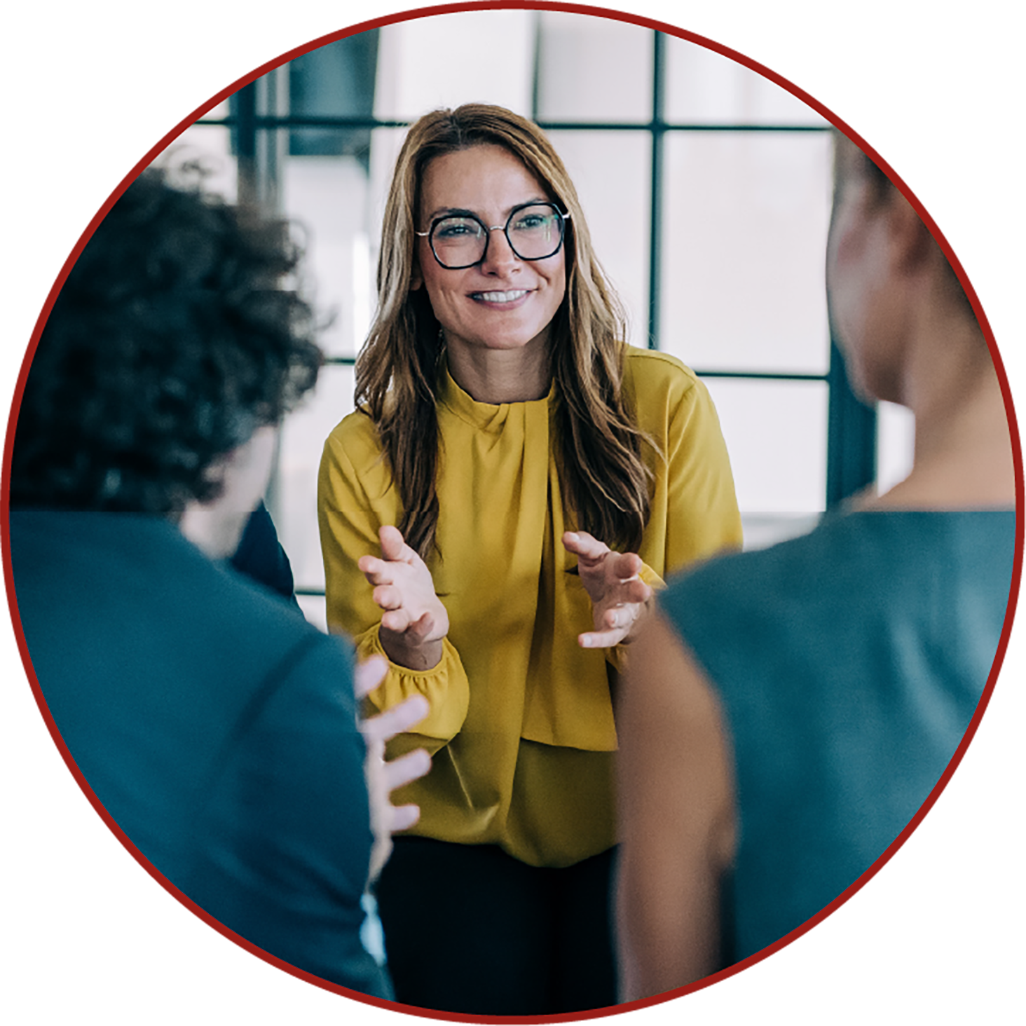 woman smiling and waving her hands